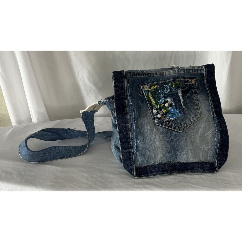 Up-cycled denim crossbody bag boho, floral embroidered, distressed, raw edges,